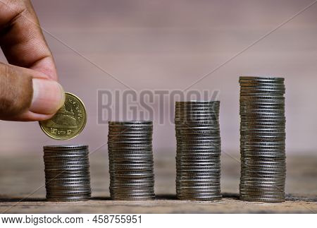Save Money And Account Banking For Finance Concept, Hand Bank With Coin On Blurred Background, Save 