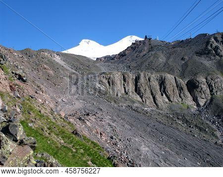 View From Mount Cheget To Mount Elbrus Covered With Snow, The Highest Mountain In Europe, The Caucas