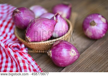 Shallots Or Red Onion, Purple Shallots On Basket , Fresh Shallot For Medicinal Products Or Herbs And