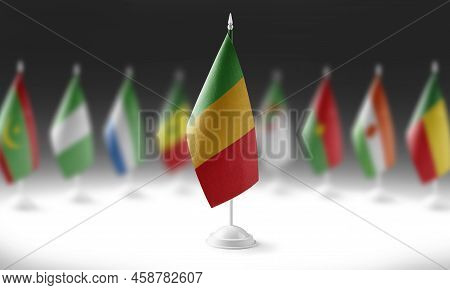 The National Flag Of The Mali On The Background Of Flags Of Other Countries