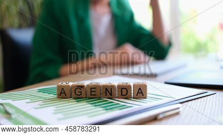 Close-up Of Agenda Word Collected Of Wooden Cubes In Row. Business Of Day, Time Management Planning 