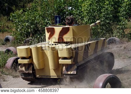 Kiev, Ukraine August 23, 2020: Children Ride Mock-ups Of A German Tiger Tank And A Russian T34 At Th