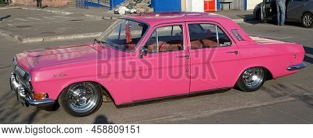 Kiev, Ukraine May 1, 2021: Volga Or Gaz-24 Car In Pink After Tuning