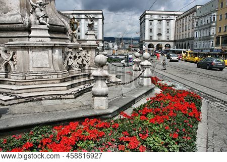 Linz, Austria - August 5, 2008: People Visit The Main Square Hauptplatz In Linz, Austria. It Is The 