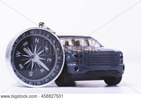 Tourist Travel By Car. Travel By Car. Compass And Car. Autotourism. Traveling Across Countries By La