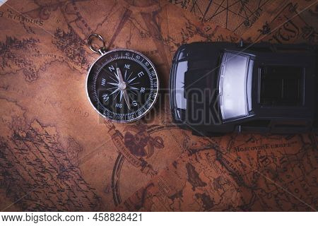 Tourist Travel By Car. Travel By Car. Compass And Car. Autotourism. Traveling Across Countries By La