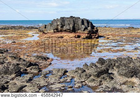 Volcanic Black Rocks On Dodds Creak Beach - Flinders, Victoria, Australia