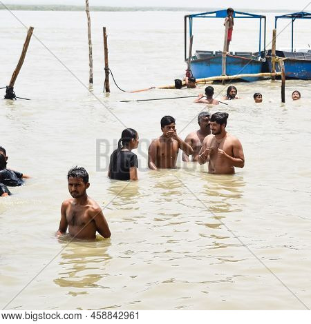 Garh Mukteshwar, Uttar Pradesh, India - June 11 2022 - People Are Taking Holy Dip On The Occasion Of