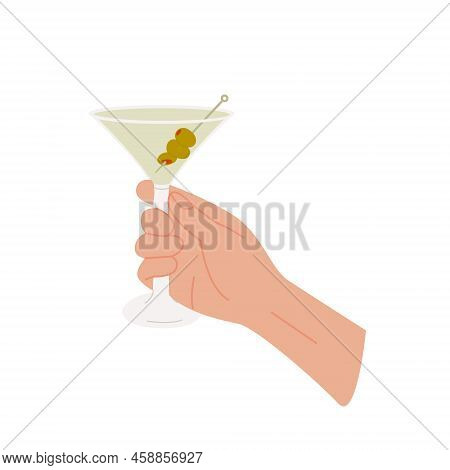 Female Or Male Hand Holding Martini Glass With Classic Cocktail Garnished With Green Olives. Glass W