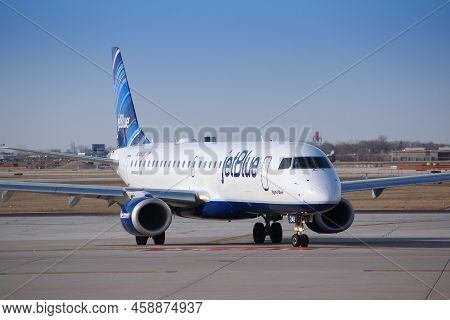 Chicago, United States - April 1, 2014: Jetblue Embraer Taxies After Landing At O'hare Airport In Ch