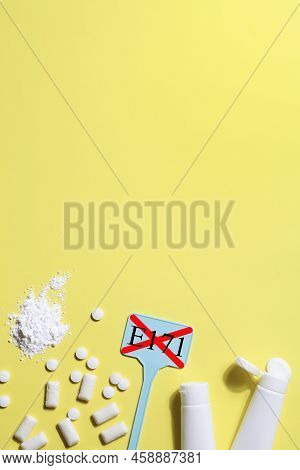 Titanium Dioxide, E171, Dangerous Additive Concept. Gum, Pills, Toothpaste, Powder And Sign With E17