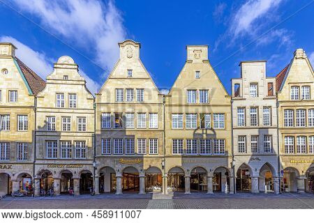Muenster, Germany - April 30, 2022: Scenic View To Facade Of Old Historic Houses In Panoramic View A