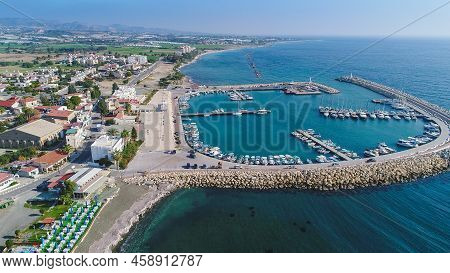 Aerial Bird's Eye View Of Zygi Fishing Village Port, Larnaca, Cyprus. The Fish Boats Moored In The H
