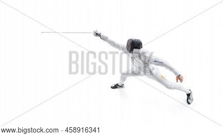 Aerial View Of Male Fencer In Fencing Costume And Mask Holding Smallsword And Training Isolated On W