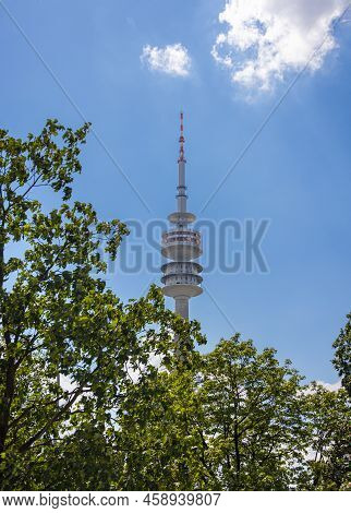 Munich, Germany - July 6, 2022: The Olympiaturm (olympia Tower) At Olympia Park. Looking Up Through 