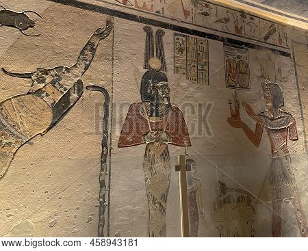 Egypt, Ancient Hieroglyphs. The Photo Shows Ancient Egyptian Hieroglyphs, Drawings On The Walls.