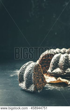 Delicious Chocolate Cake. Cupcake On A Dark Table. Chocolate Biscuit. 
Traditional Christmas Cake Pu