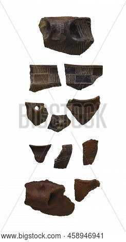 Set Of 11 Shards Or Fragments Of Neolithic Stone Jars From The Island Of Mochlos. Isolated On White 