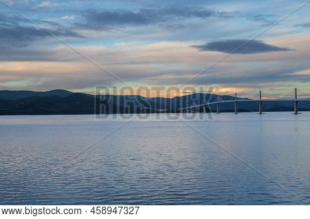 Beautiful Bridge Across The Sea To Peljesac Peninsula In Croatia. There Are Dramatic Clouds In The S