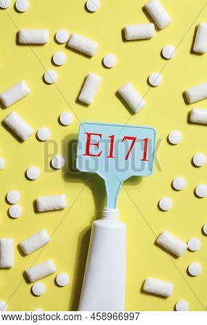 Titanium Dioxide, E171, Dangerous Additive Concept. Gum, Pills, Toothpaste Or Cream And Sign With E1