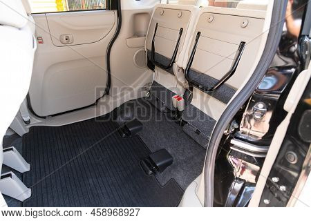 Novosibirsk, Russia -  July 29, 2022:   Honda N-box, Car Interior, Part Of Back Folded  Seats