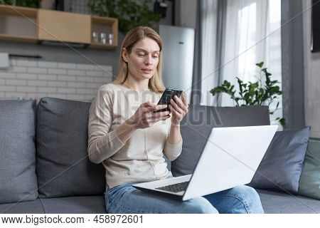Happy Woman Working At Home On Laptop, Freelancer Sitting On A Miracle