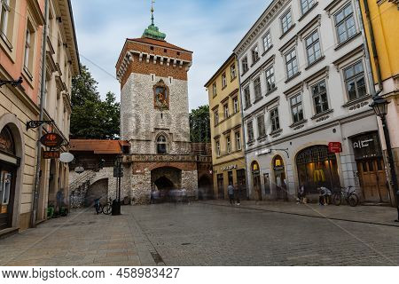 Cracow, Poland - July 3 2021: Florianska Gate At The End Of Florianska Street Full Of People
