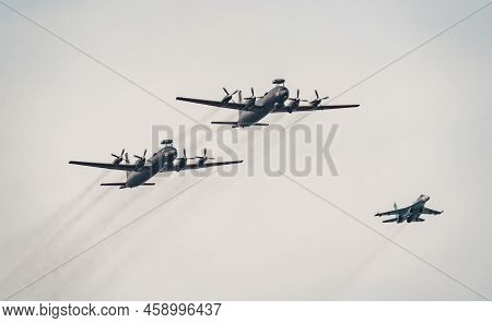 Russia, St. Petersburg, 28 July 2022: Military Aircraft And Helicopters Of The Air Force Fly On The 