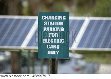 Sign For Electric Plug-in Cars Only Charging With Electricity From Solar Renewable Power Source