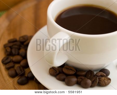 Kop kaffe og bønner