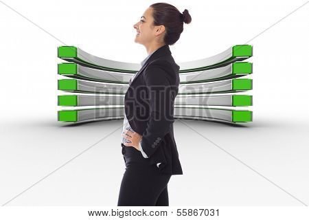 Happy businesswoman against green and white curved structure