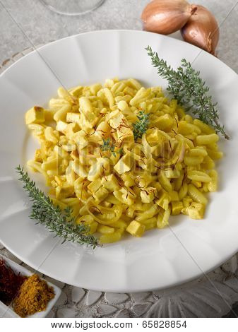 malloreddus pasta with mozzarella onions and saffron