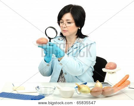 Expert Viewing Closely A Red Potato In Laboratory