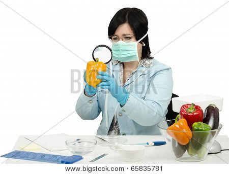Expert Viewing Closely A Yellow Bell Paper In Laboratory