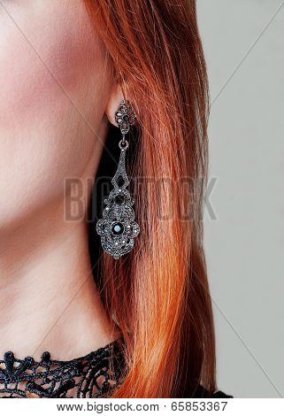 Earring On Woman's Ear