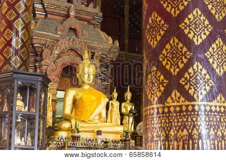 Golden Buddha With Thai Art Painting On Pole