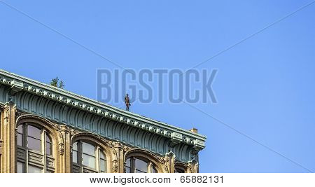 Statue Of Man From Artist Antony Gormley On The Roof
