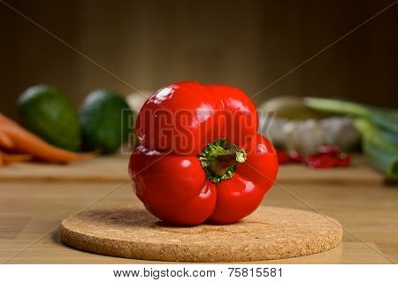Red pepper on a wooden table
