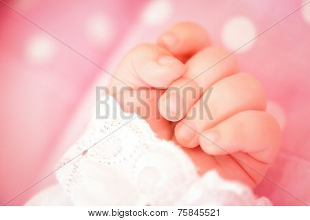 Newborn baby hand.
