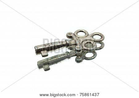 A Vintage Iron Key On A Mirror