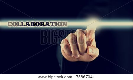 Businessman Activating A Collaboration Button On Virtual Screen