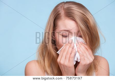 Flu Allergy. Sick Girl Sneezing In Tissue. Health