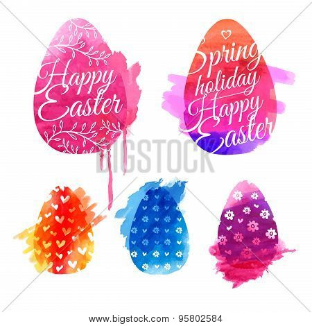 Set of colored eggs with watercolor textures. Lettering Happy Easter. Patterns of simple silhouettes