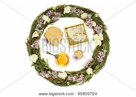 Honey And Herbs Composition On White Background