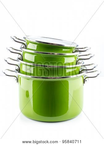Set of four green enamel pots shot on white background