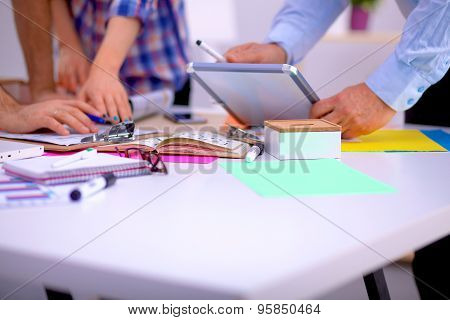 Young business people working at office on new project