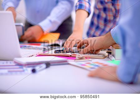 Young business people working at office on new project