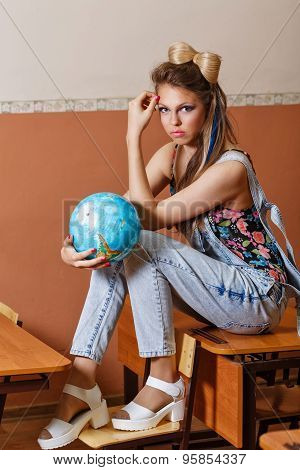 Wild Child In Geography Class With Globe.