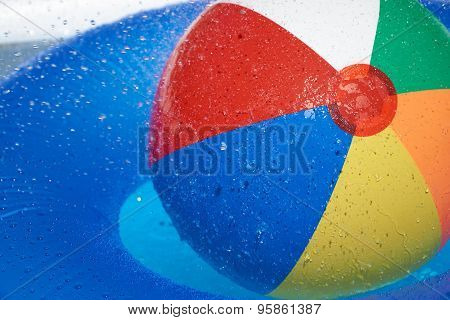 Floating Tire And Beach Ball In The Pool