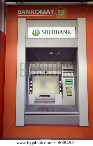 BRATISLAVA, SLOVAKIA - SATURDAY, APRIL 11, 2015: A Sberbank ATM. Sberbank Slovensko, a. s., is a subsidiary of the Russian savings bank, Sberbank.  